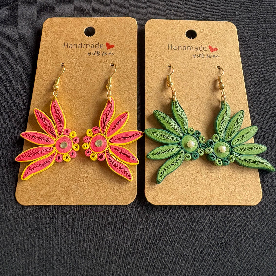 Two pairs of floral earrings on brown cards with 'Handmade with Love' text.
