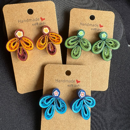 Three pairs of handmade earrings on brown cards with 'Handmade with Love' text.